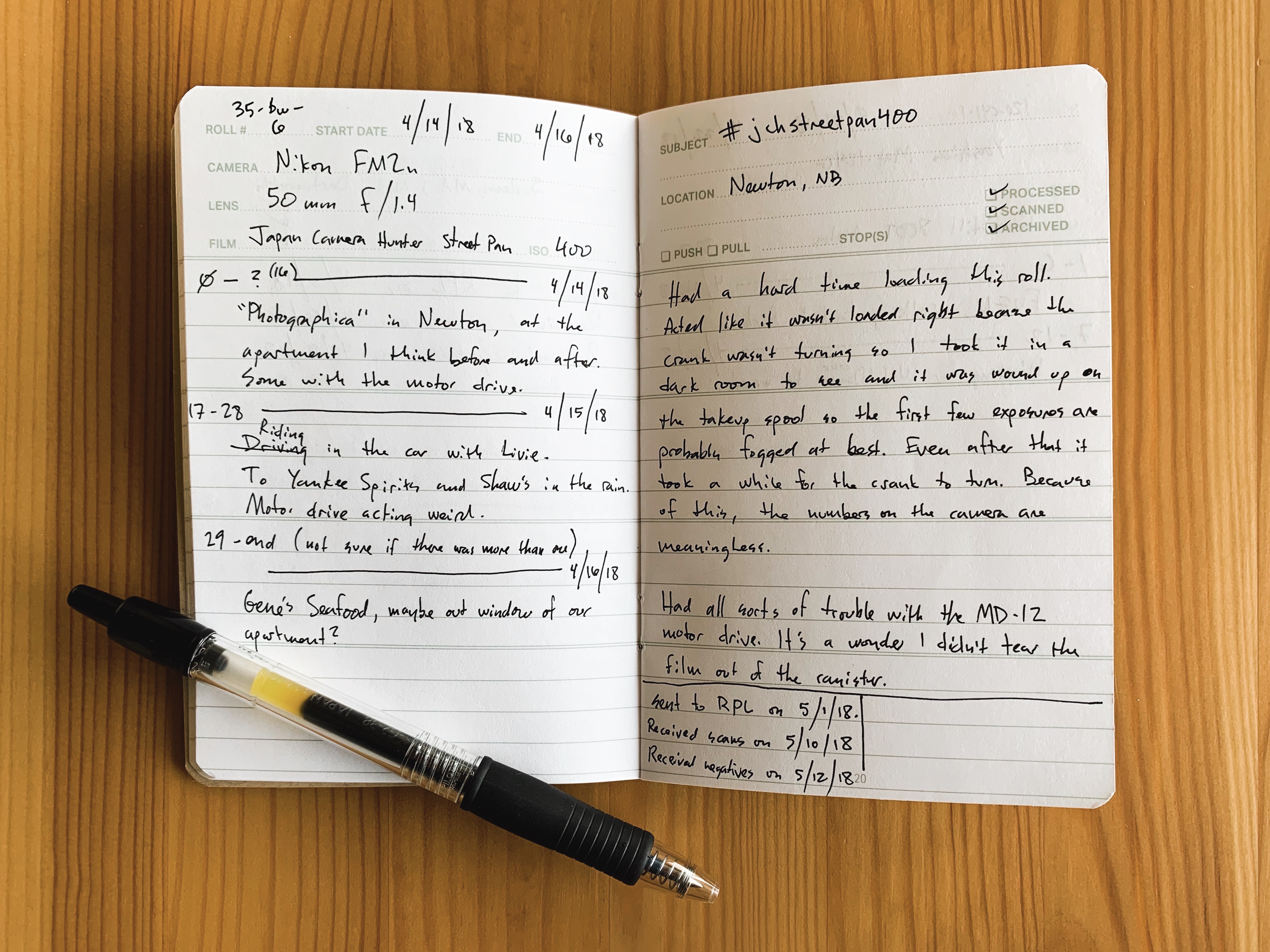 A PhotoMemo book with lots of notes in it.